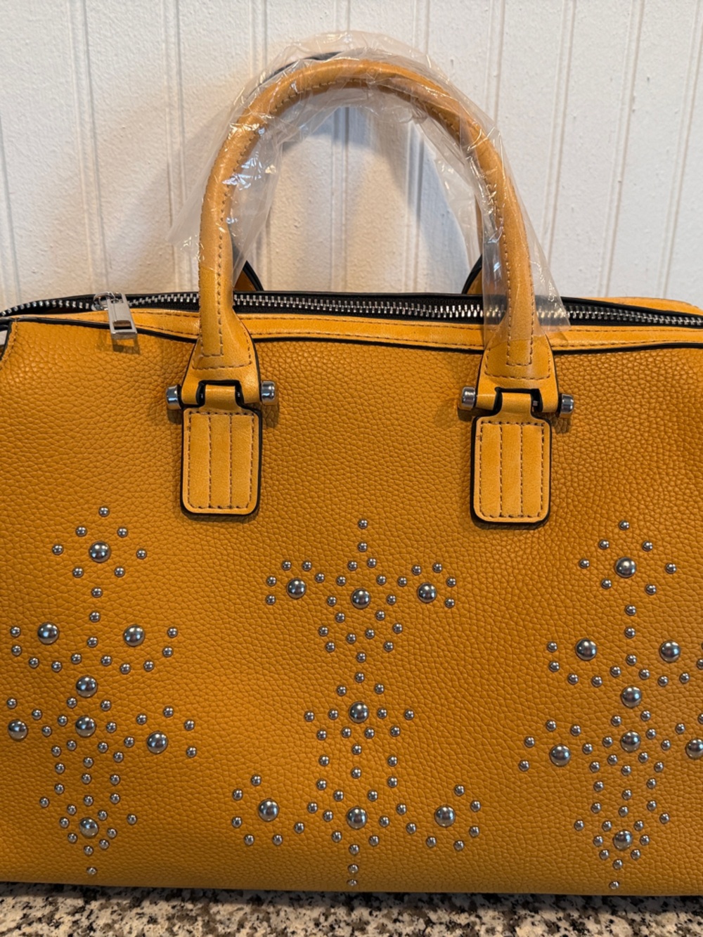 New with tags, Mellow World, vegan handbag. Mustard yellow with silver studs.